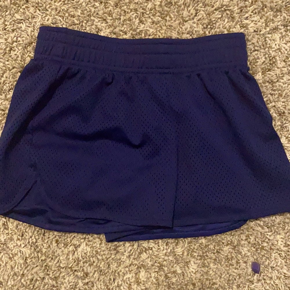 The color is a dark blue and the brand is BCG in a medieval kids 8-10 made
